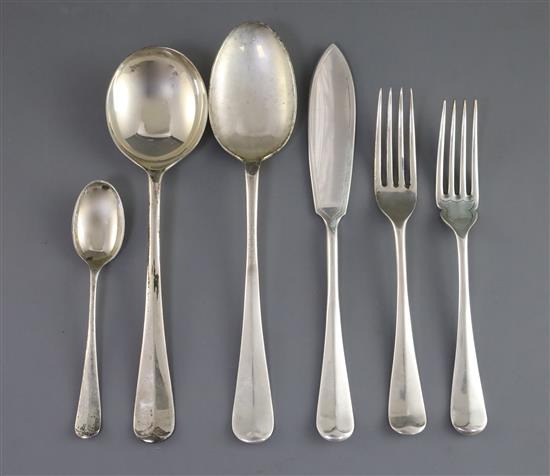 A George V part canteen of silver rat-tail pattern cutlery by Harrods Ltd (Richard Woodman Burbridge), 146 oz.